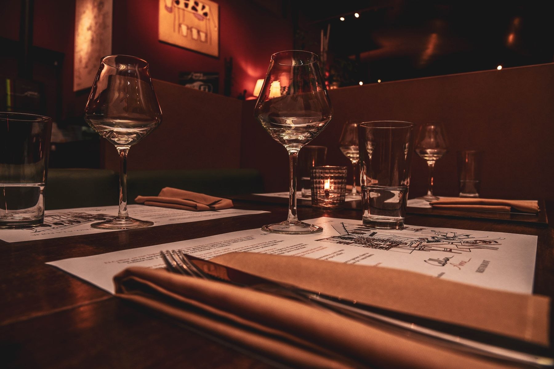 An elegant restaurant table setting at night
