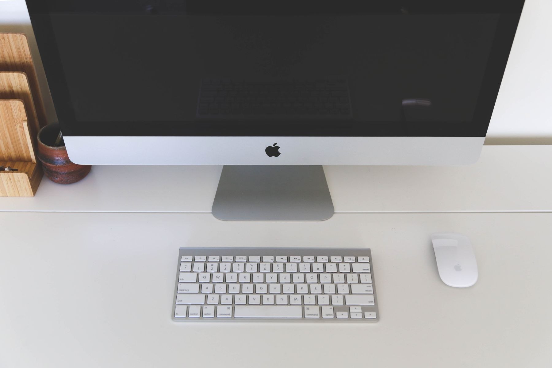 A clean, minimal desk setup with an iMac